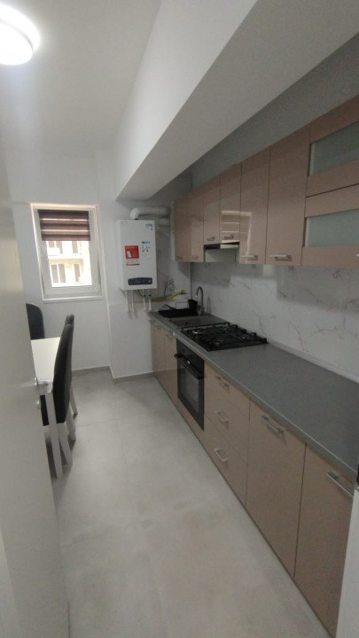 APARTAMENT 2 CAMERE DECOMANDAT,PRIMA CHIRIE MOBILAT, BLOC NOU