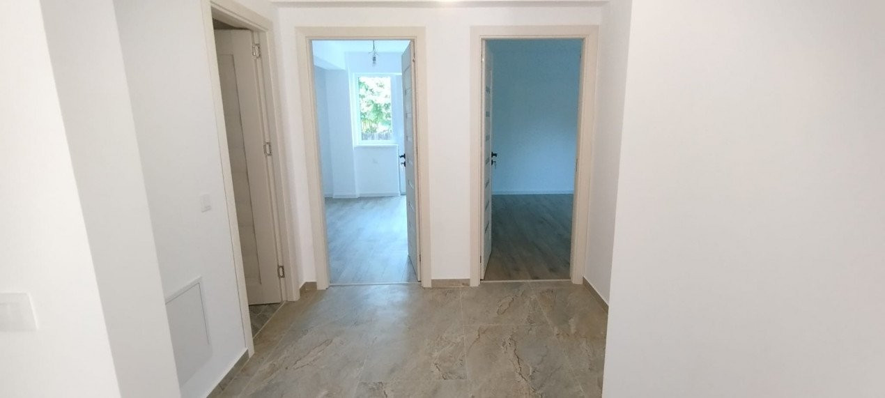 APARTAMENT 3 CAMERE, DECOMANDAT, BLOC TIP VILA, NOU, GRADINA 150 MP + TERASA