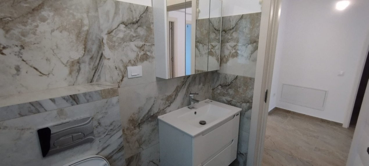 APARTAMENT 3 CAMERE, DECOMANDAT, BLOC TIP VILA, NOU, GRADINA 150 MP + TERASA